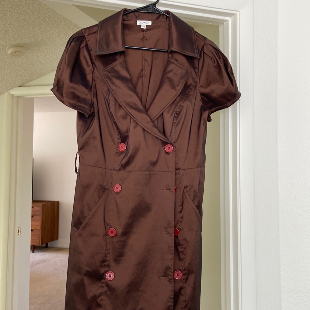 Double breasted fitted copper colored dress. Size 12. Missing belt.
